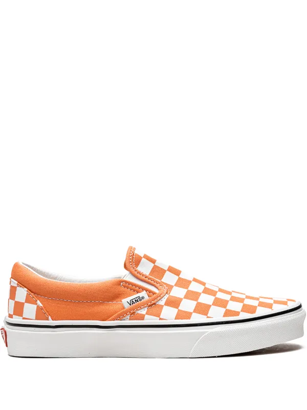 Orange slip on sale on vans