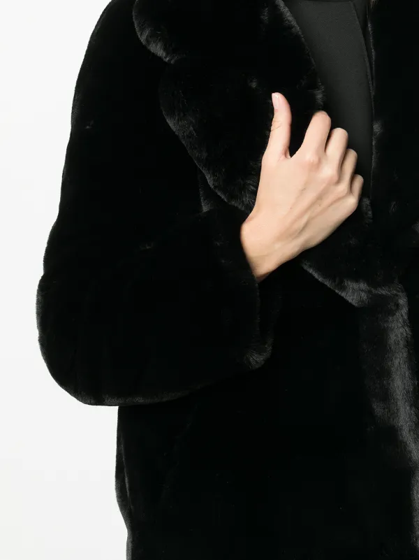 Oversized faux fur coat with clearance hood