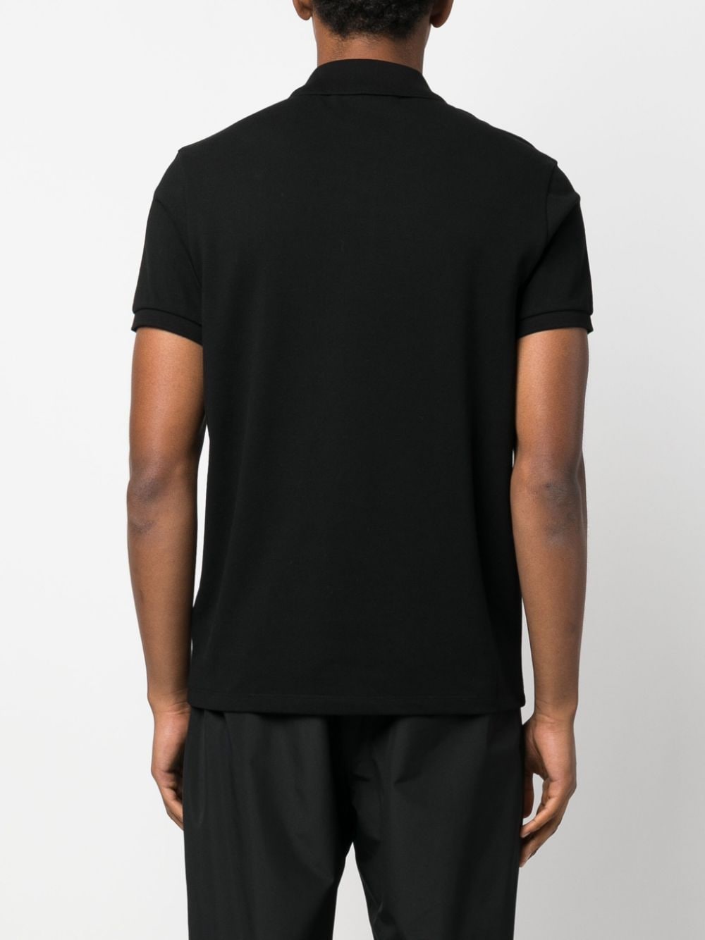 Shop Moncler Logo-patch Polo Shirt In Black