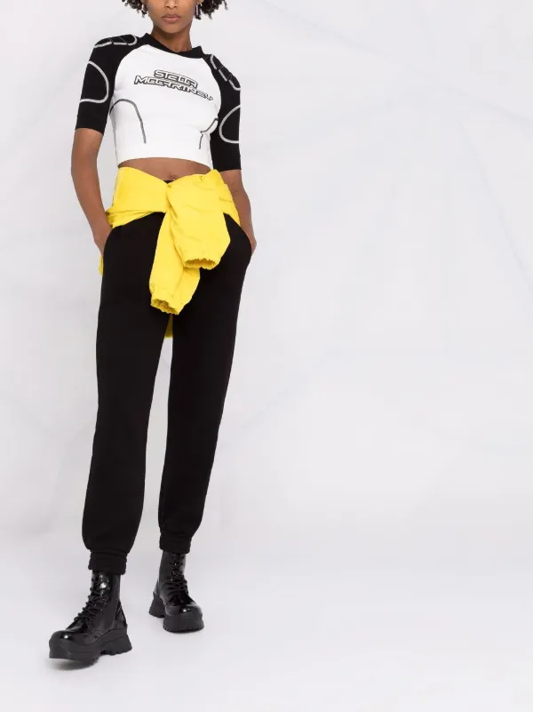 Tシャツ・カットソー STELLA MCCARTNEY TOP WITH LOGO PRINT Women Black Logo Graphic T-Shirt | Stella McCartney US