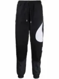 Nike Swoosh-print track pants - Black