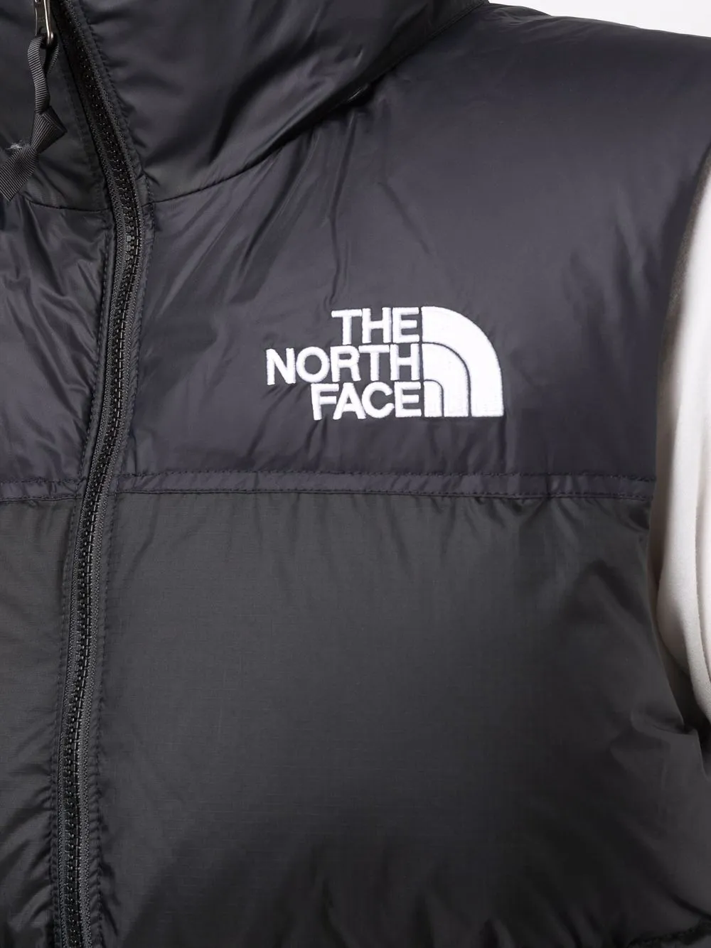 фото The north face дутый жилет с логотипом