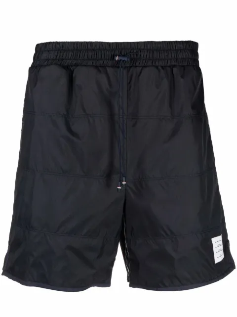 Thom Browne shorts deportivos con detalles