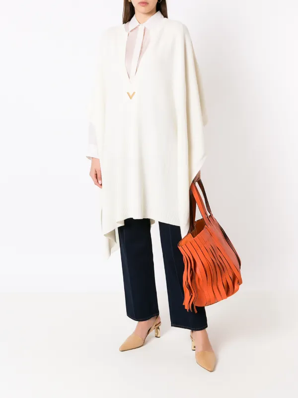 Valentino Garavani ロゴプレートニットポンチョ | ホワイト | FARFETCH JP