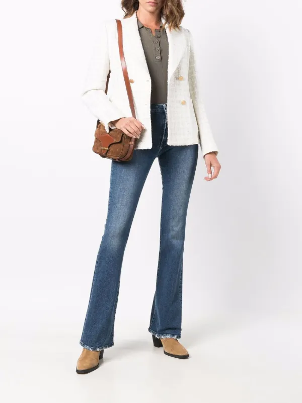 Shop 3x1 stonewashed flare-cuff jeans 