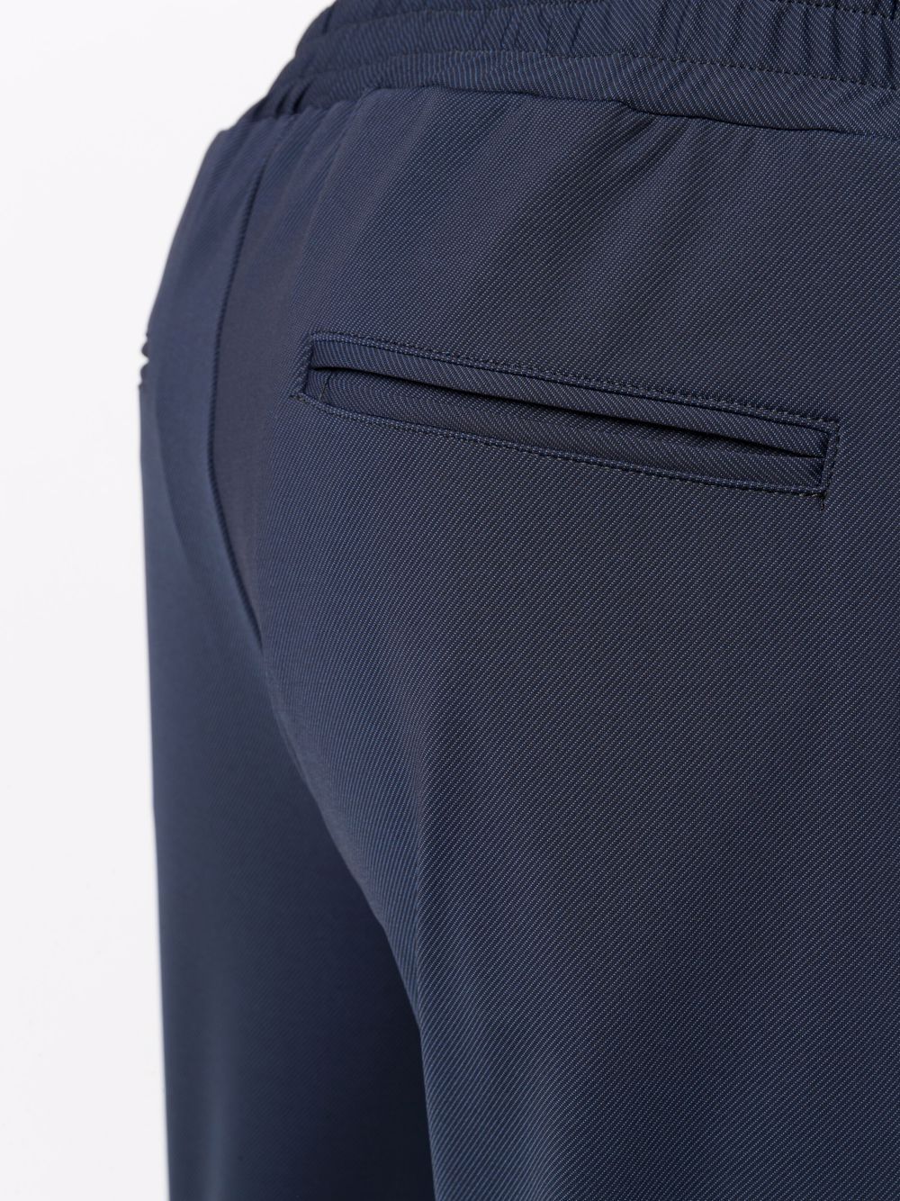tapered elasticated track pants