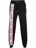 GCDS side logo stripe track pants - Black
