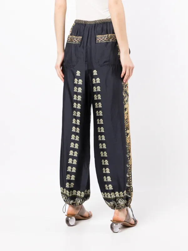 Over Torero-print parachute trousers 
