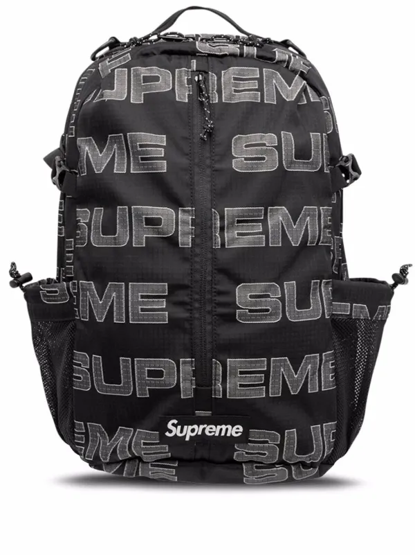 Supreme logo-print Backpack - Farfetch