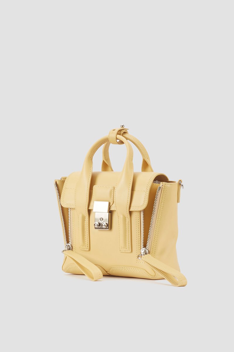 Pashli Mini Satchel-yellow #1 Pashli Mini Satchel, Wheat yellow calf leather small Pashli tote bag from 3.1 PHILLIP LIM featuring tonal stitching, zip details, silver-tone hardware, internal logo stamp, main compartment, internal zip pocket, foldover top, push-lock fastening, two rounded top handles and detachable shoulder strap.- 1