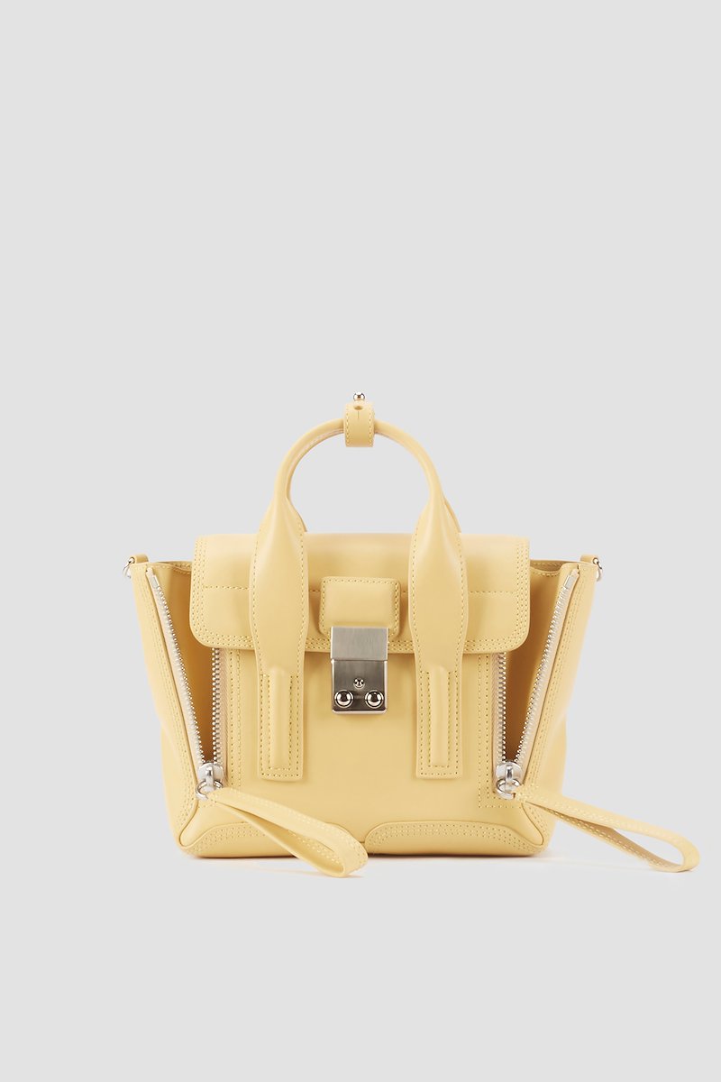 Pashli Mini Satchel-yellow #0 Pashli Mini Satchel, Wheat yellow calf leather small Pashli tote bag from 3.1 PHILLIP LIM featuring tonal stitching, zip details, silver-tone hardware, internal logo stamp, main compartment, internal zip pocket, foldover top, push-lock fastening, two rounded top handles and detachable shoulder strap.- 0
