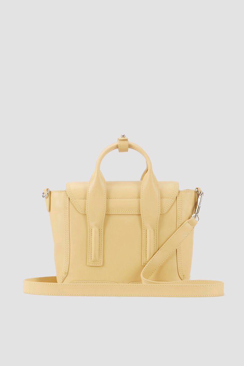 Pashli Mini Satchel-yellow #0 Pashli Mini Satchel, Wheat yellow calf leather small Pashli tote bag from 3.1 PHILLIP LIM featuring tonal stitching, zip details, silver-tone hardware, internal logo stamp, main compartment, internal zip pocket, foldover top, push-lock fastening, two rounded top handles and detachable shoulder strap.- 2
