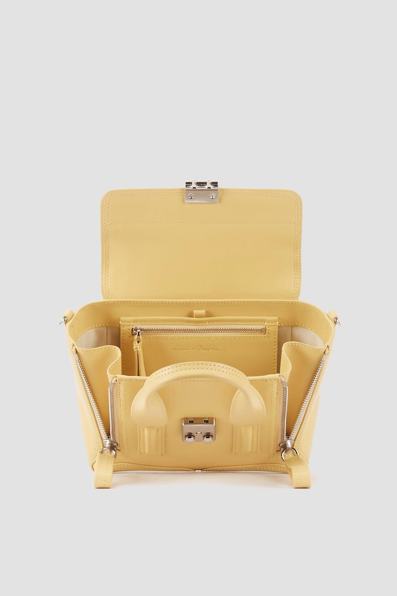 Pashli Mini Satchel-yellow #1 Pashli Mini Satchel, Wheat yellow calf leather small Pashli tote bag from 3.1 PHILLIP LIM featuring tonal stitching, zip details, silver-tone hardware, internal logo stamp, main compartment, internal zip pocket, foldover top, push-lock fastening, two rounded top handles and detachable shoulder strap.- 3