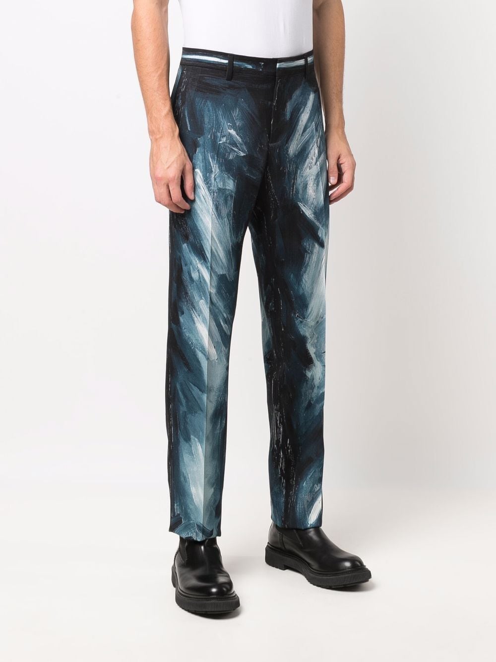 Shop Moschino Paint Stroke-print Trousers In Blue