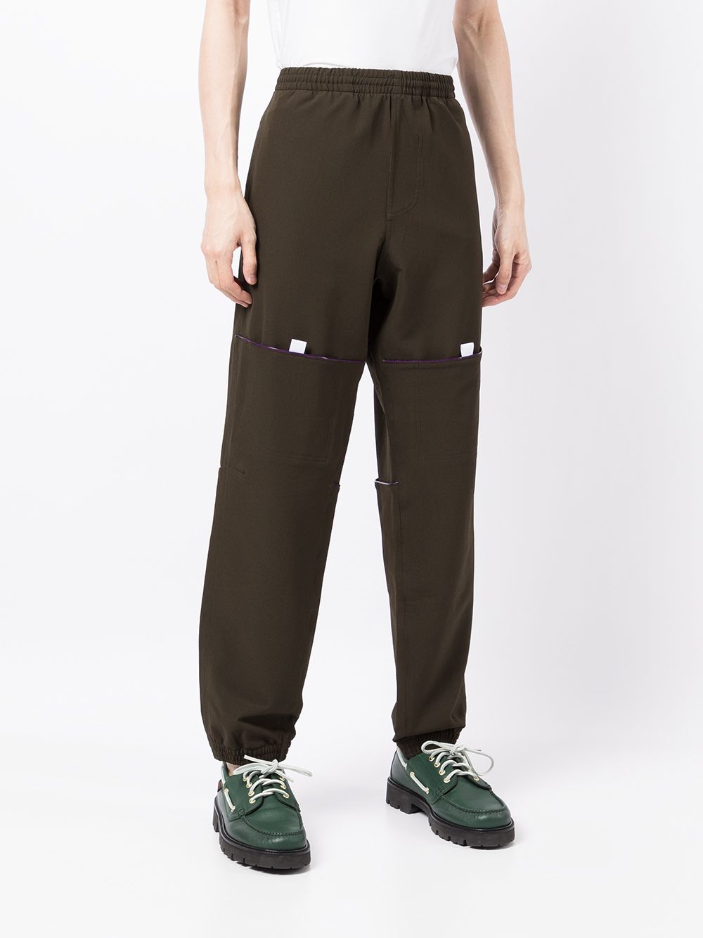 Shop Jacquemus Shell Tapered Trousers In Grün