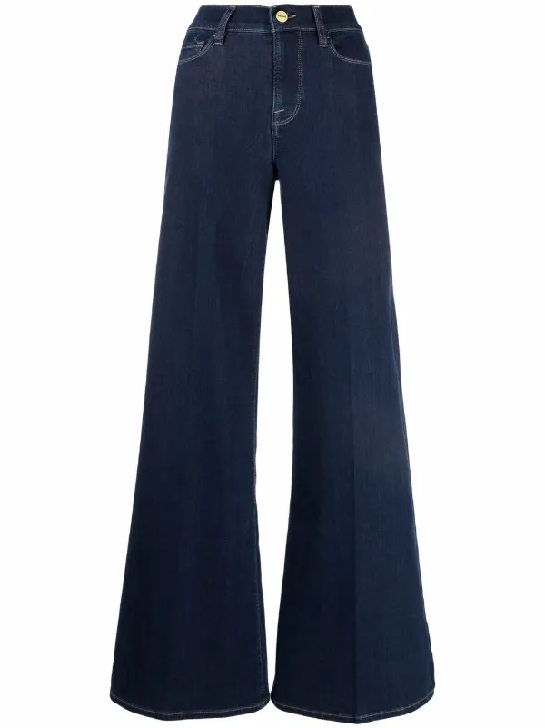 Shop FRAME mid-rise flared jeans with 