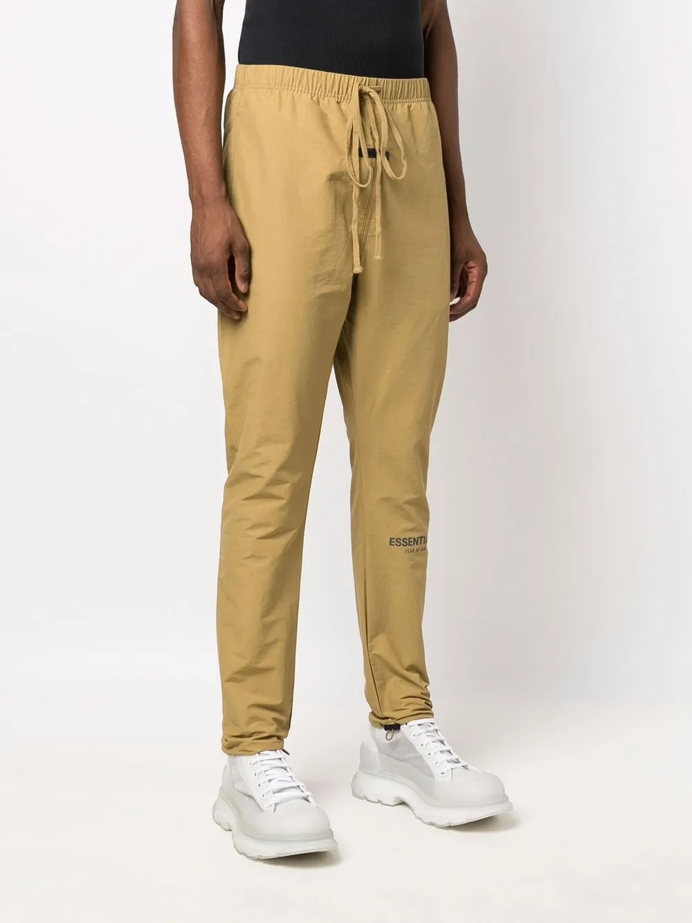 FEAR OF GOD ESSENTIALS Trainingsbroek met logoprint Beige