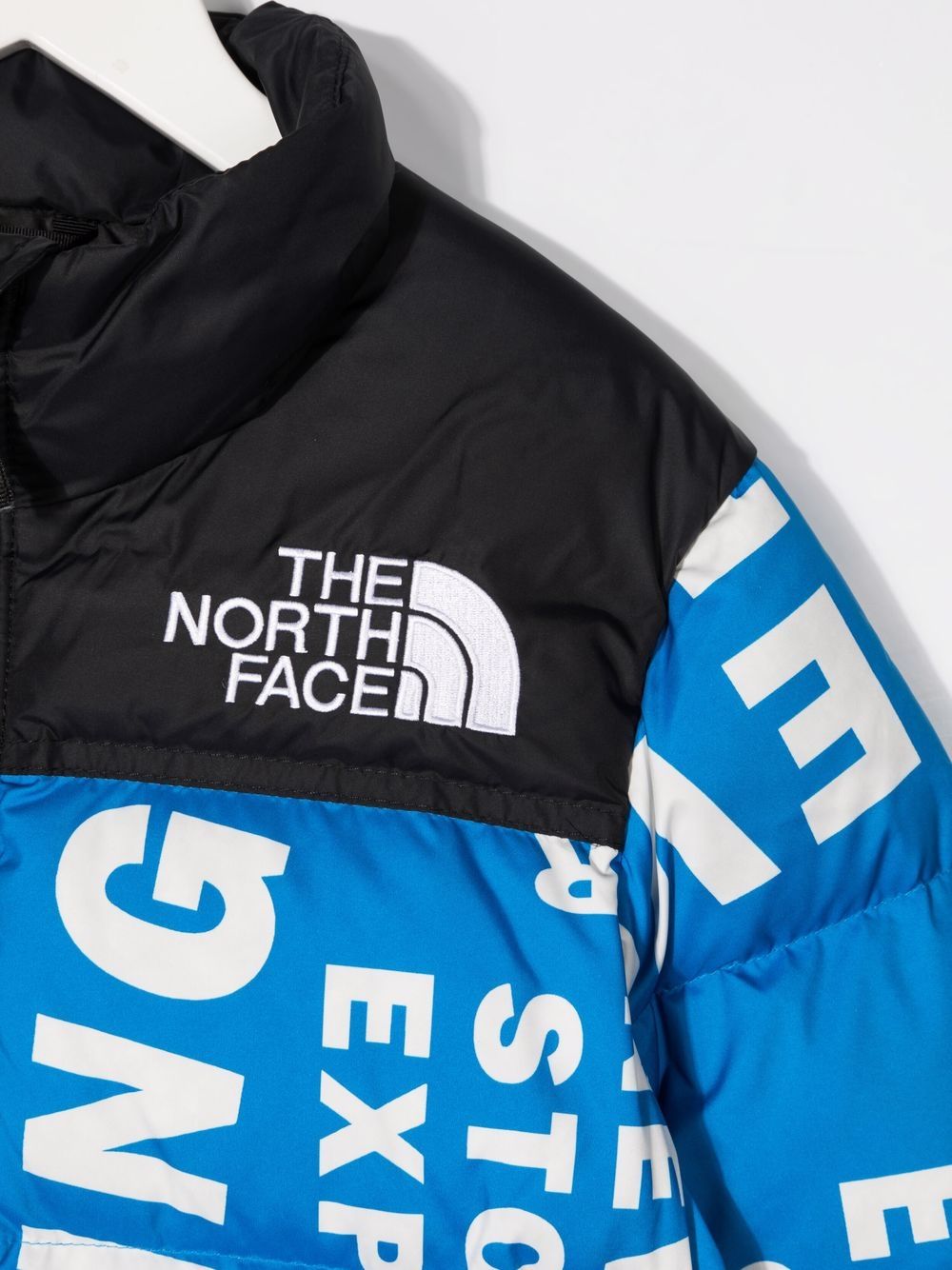 фото The north face kids пуховик с надписью