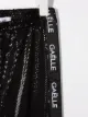 Gaelle Paris Kids shiny logo print trousers
