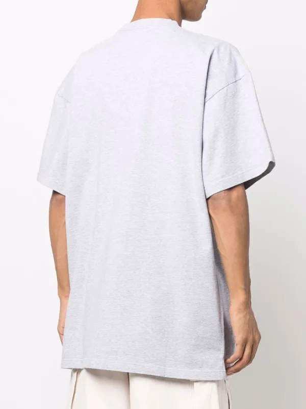 Balenciaga graffiti-logo T-shirt - Farfetch