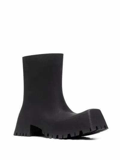 Balenciaga Trooper rubber low boots black | MODES