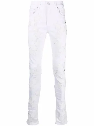 AMIRI white star-patch skinny jeans for 