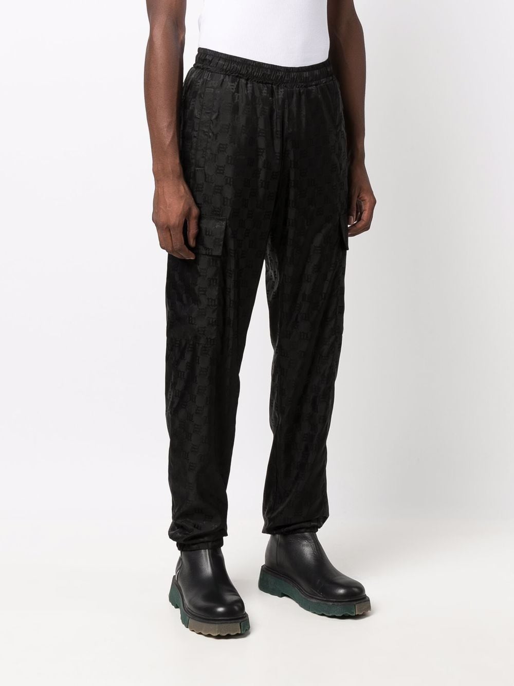 Shop Misbhv Monogram-print Trousers In 黑色