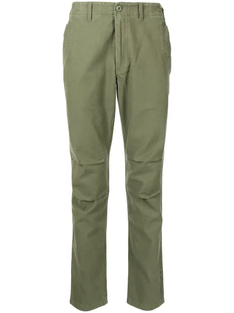 Maharishi pantalones slim de corte tapered