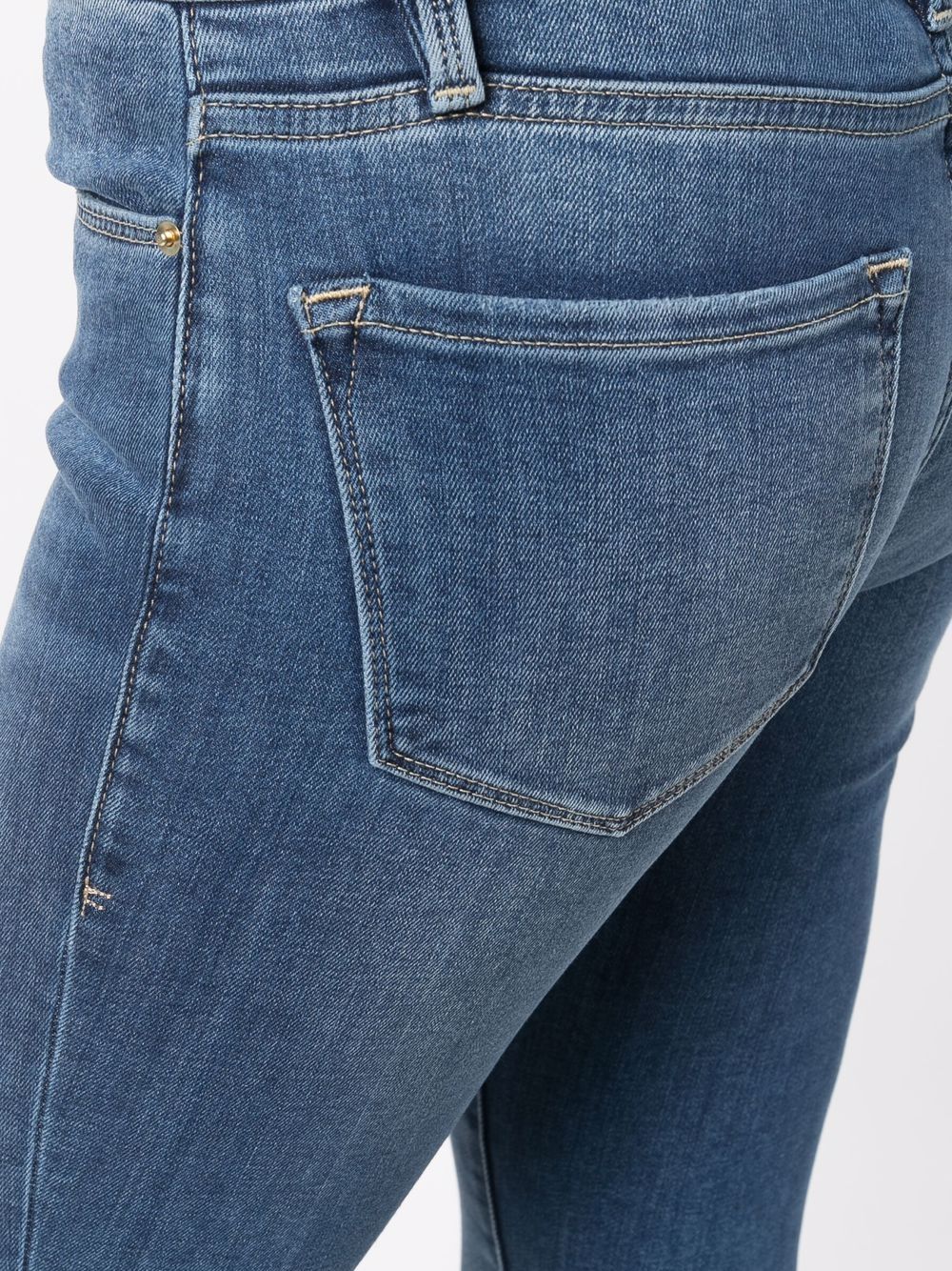 Shop Frame Low-rise Skinny Jeans In Blue