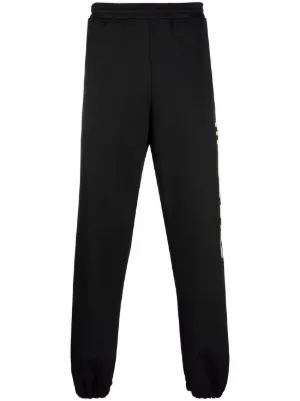 Heron Preston CTNMB logo-print track-pants | Black | FARFETCH CA