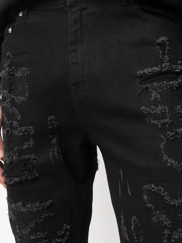Billy the Kid ripped jeans