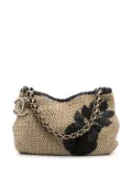 CHANEL Pre-Owned Camélia patch woven shoulder bag - Neutrals