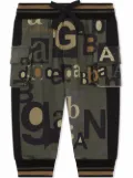 Dolce & Gabbana Kids all over logo-print track trousers - Green