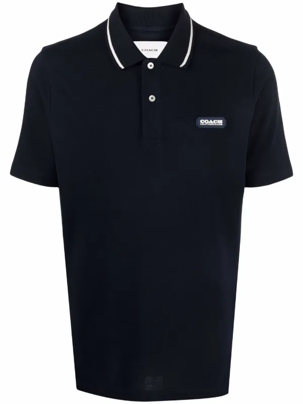 white shirt with red dragon