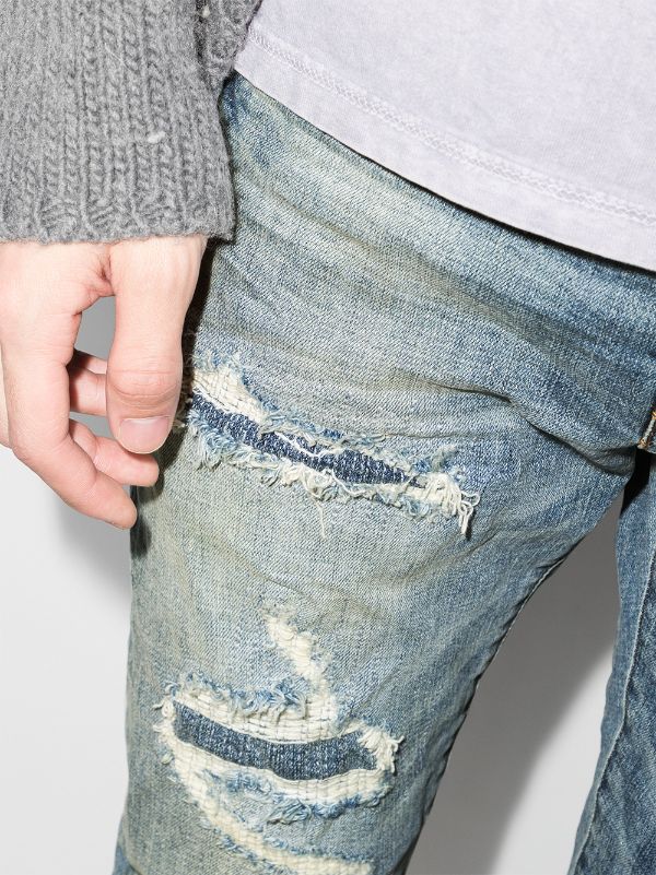 P001 Distressed Stretch Skinny Jeans
