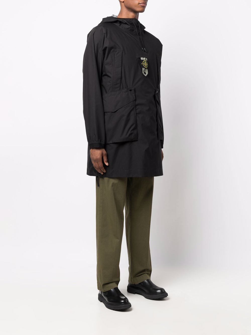 Shop Stone Island Logo-patch Drawstring-hood Raincoat In Black