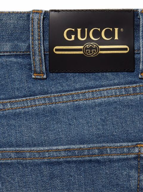 Gucci logo-patch straight-leg Jeans - Farfetch