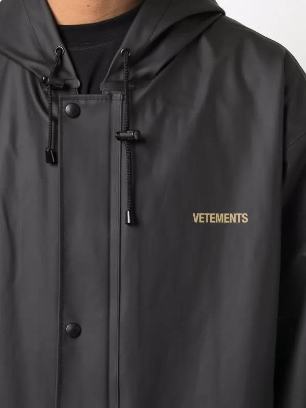 VETEMENTS logo-print Hooded Raincoat 
