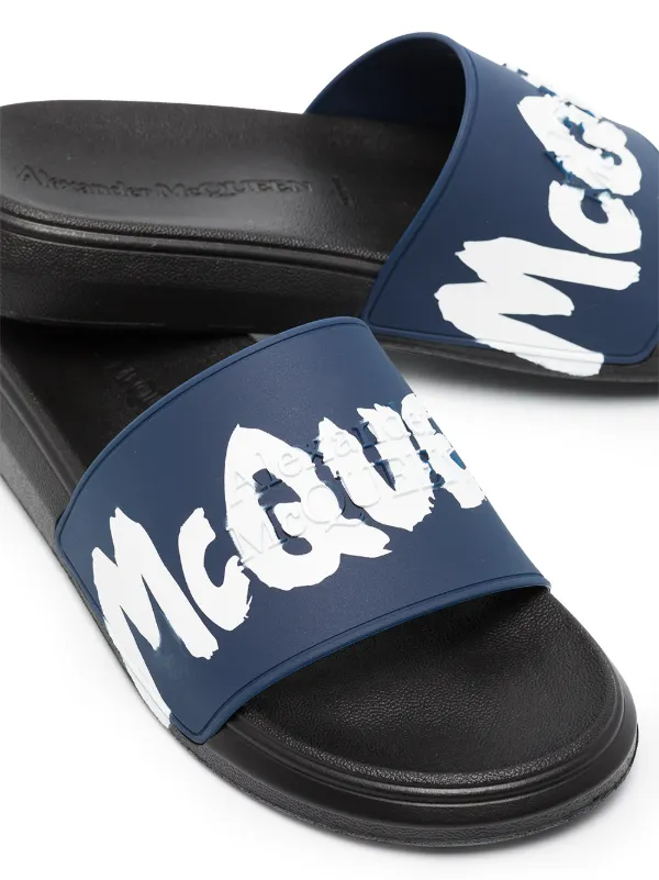 Alexander McQueen graffiti-logo slip-on Slides - Farfetch