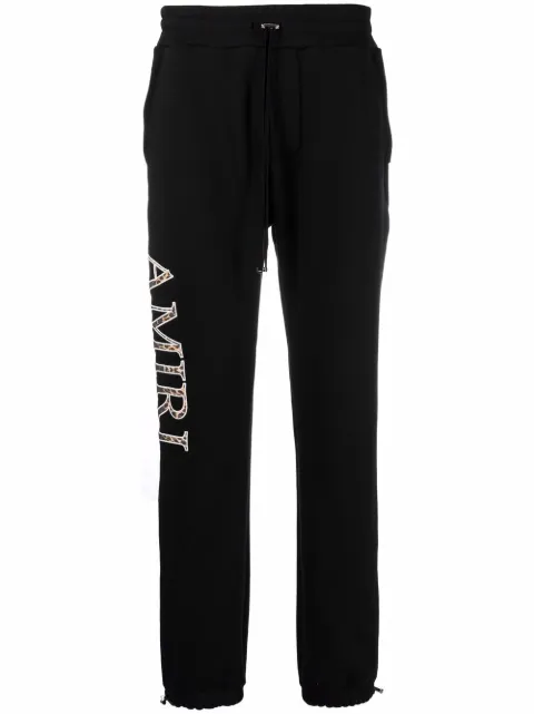 AMIRI logo print track pants