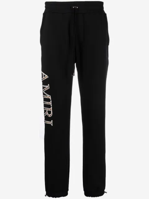 AMIRI logo print track pants
