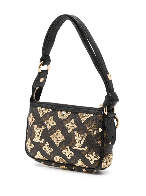 Louis Vuitton Sequin Monogram Bag. This tote features tall black leather  strap top handles and polished metal hardware including a gold toned plate  and zipper pull. Black sequins mimic the original LV