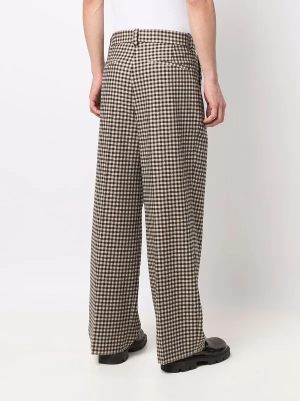 Shop Nanushka gingham wide-leg trousers 