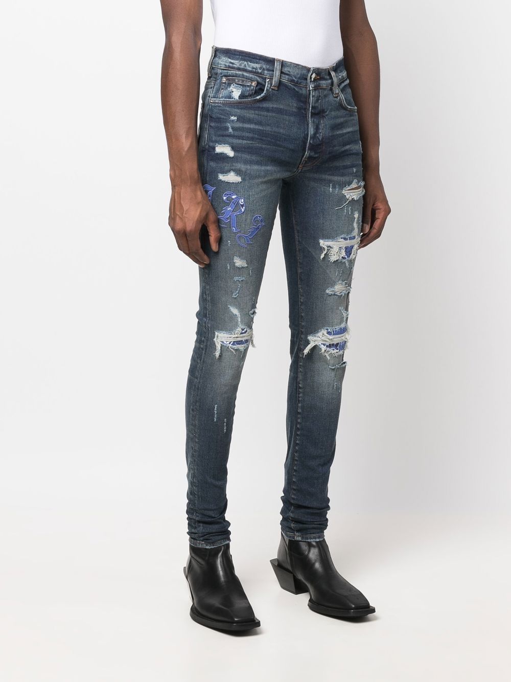 Amiri Old English Logo Skinny Jeans Farfetch