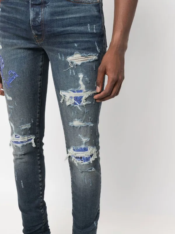 AMIRI Old English Logo Skinny Jeans 