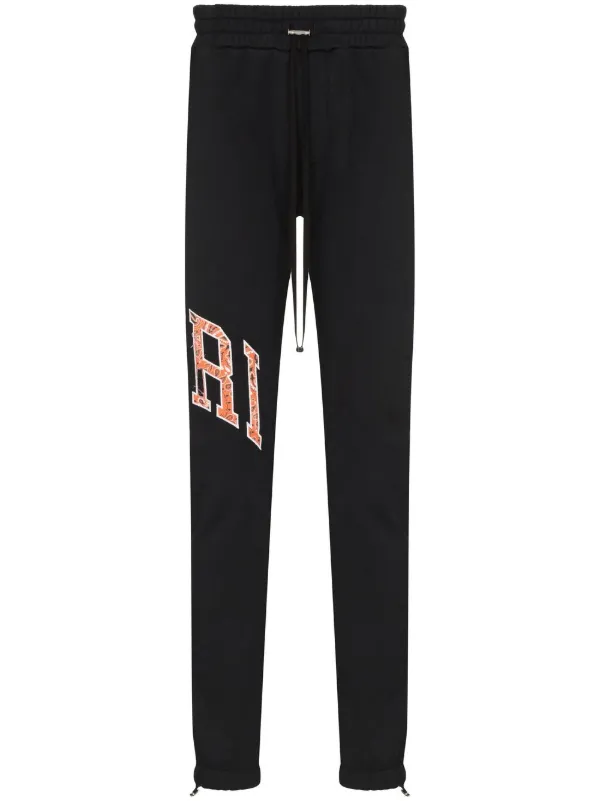 amiri track pants