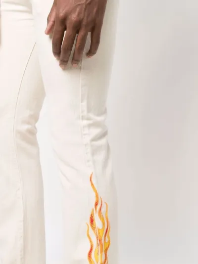 LA flame-embroidered flared jeans 
