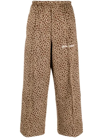 Animalier-print cropped track pants 