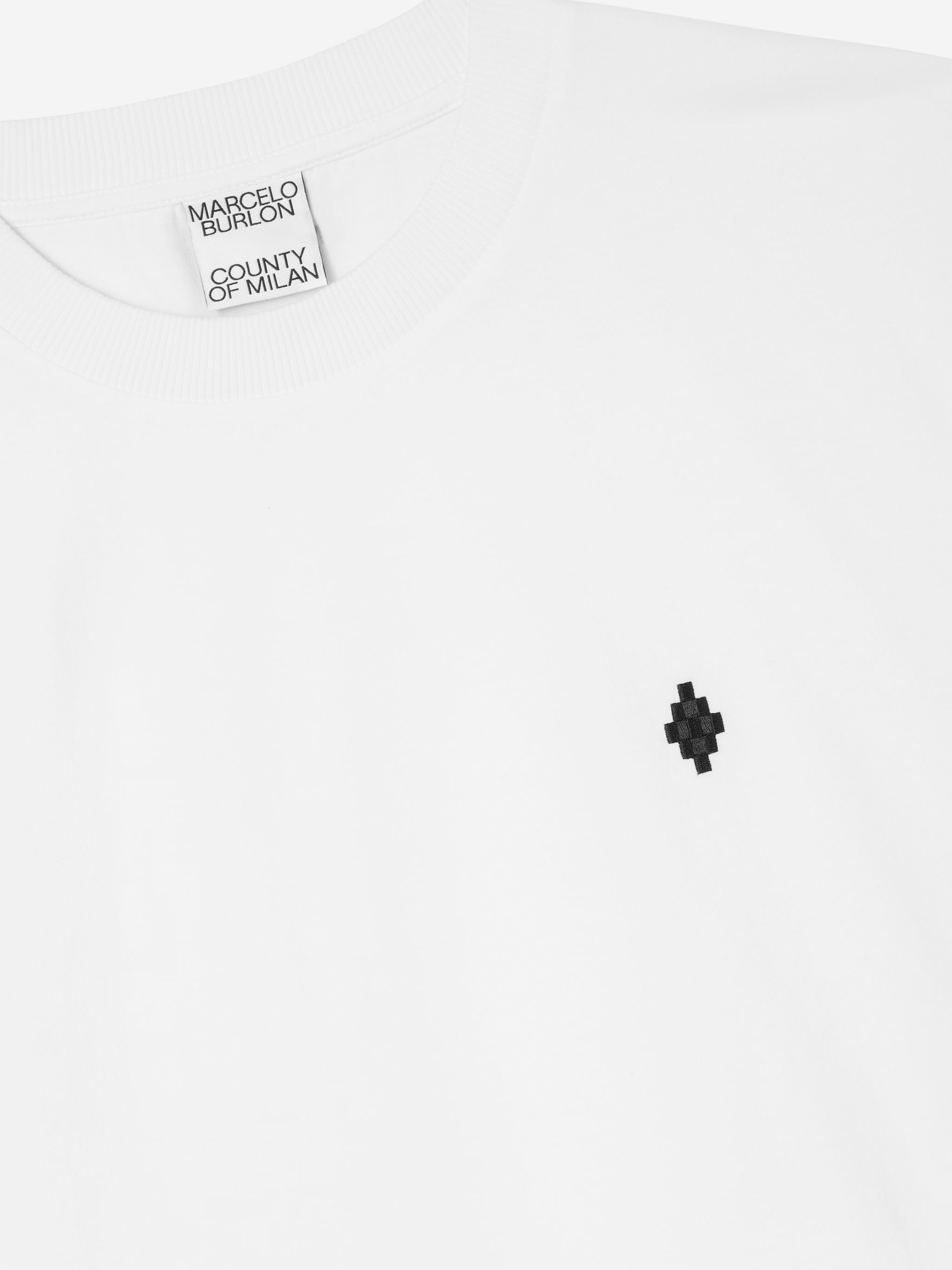 White cotton Cross-logo embroidered cotton T-shirt from Marcelo Burlon County of Milan featuring signature Cross motif, embroidered logo at the chest, round neck, short sleeves and straight hem. Conscious: This item is made from at least 50% organic materials.