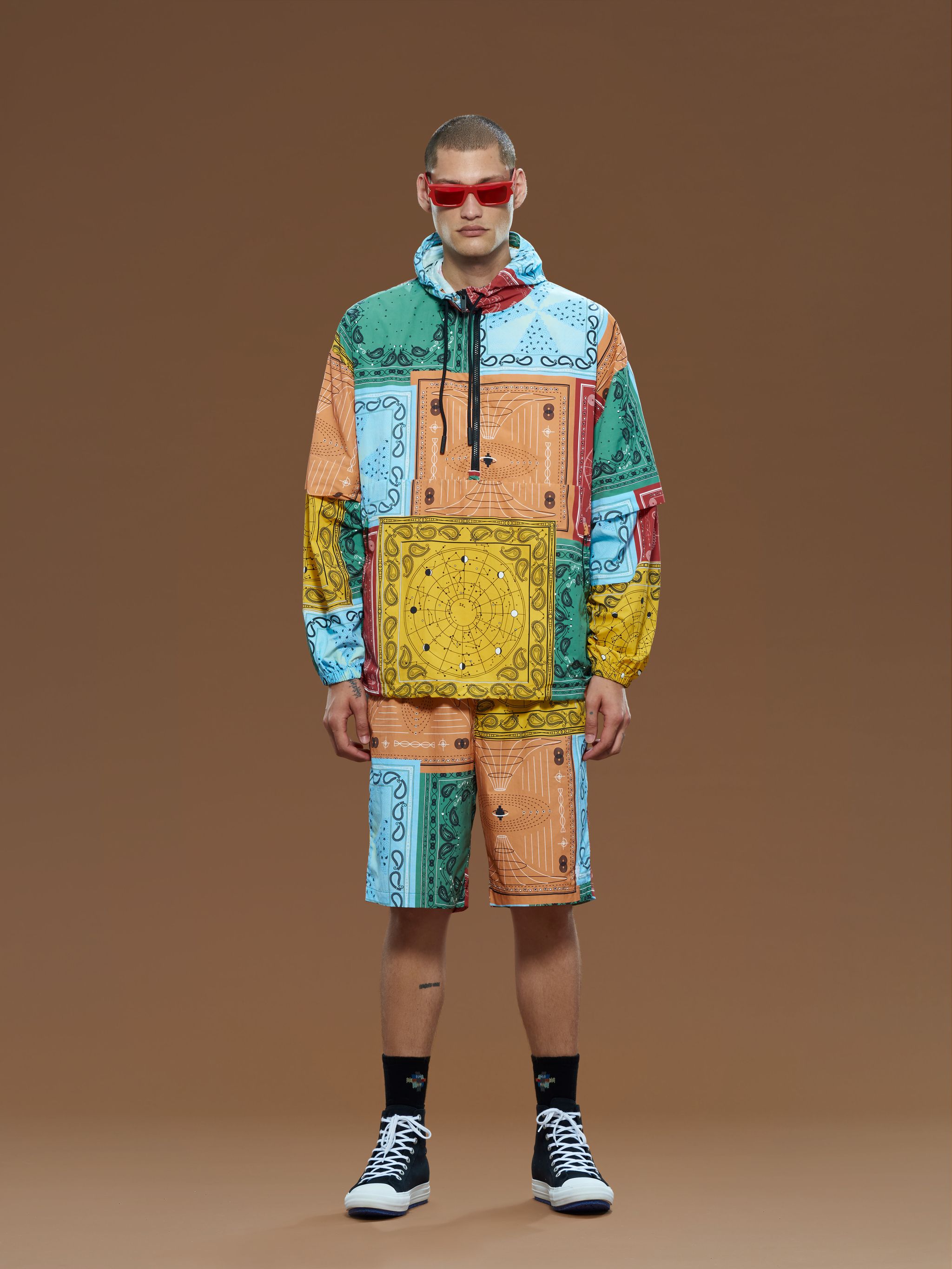 Multicolour bandana-print hooded jacket from Marcelo Burlon County of Milan featuring patchwork design, bandana print, drawstring hood, front zip fastening and long sleeves.